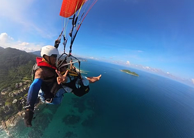 陵水黎族自治县怪兽星球滑翔伞飞行营地(香水湾店)一日游【滑翔伞体验/专业教练/极限运动】